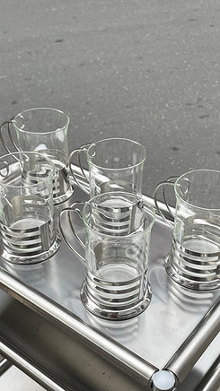 Smukke glas med stål holder